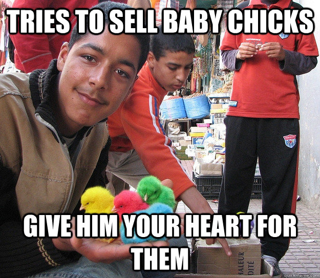 tRIES TO SELL BABY CHICKS Give him your heart for them  Ridiculously Photogenic Moroccan Guy