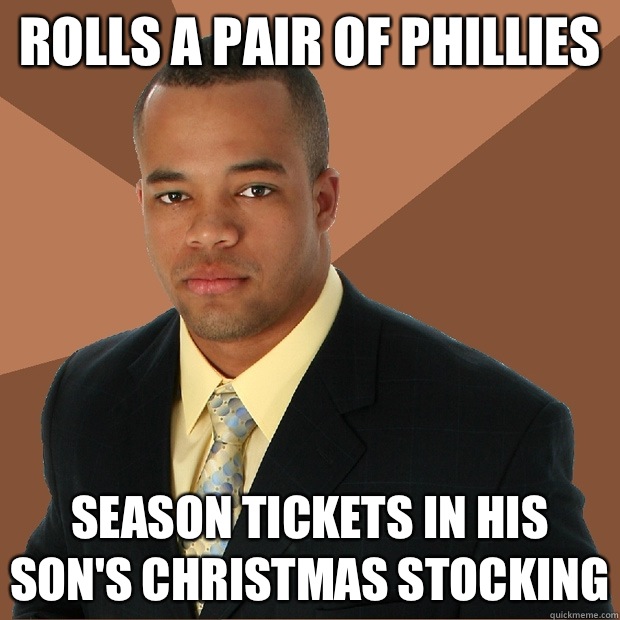 rolls a pair of phillies season tickets in his son's christmas stocking - rolls a pair of phillies season tickets in his son's christmas stocking  Successful Black Man