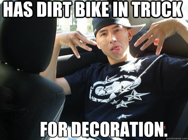 Has Dirt Bike in Truck For Decoration.  