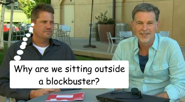 Why are we sitting outside a blockbuster?  