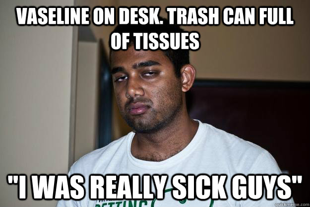 vaseline on desk. Trash can full of tissues 