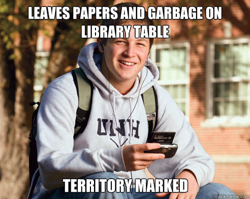 Leaves papers and garbage on library table territory marked  College Freshman