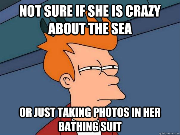 not sure if she is crazy about the sea Or just taking photos in her bathing suit  Futurama Fry