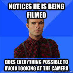 Notices he is being filmed Does everything possible to avoid looking at the camera  Socially Awkward Darcy