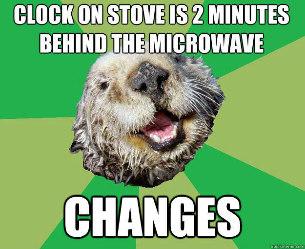 clock on stove is 2 minutes behind the microwave changes  