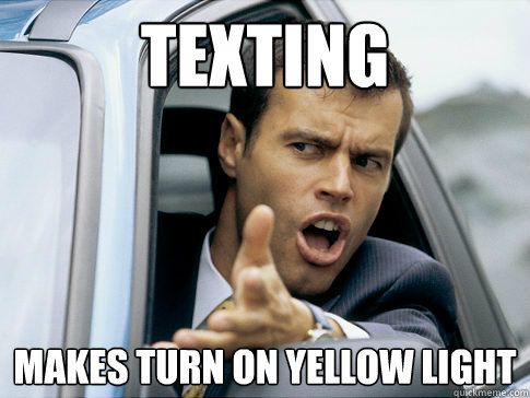 texting  makes turn on yellow light - texting  makes turn on yellow light  Asshole driver