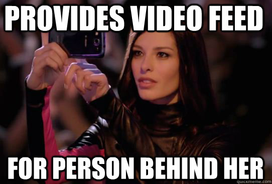 Provides video feed for person behind her - Provides video feed for person behind her  Dumbass T-Mobile Girl