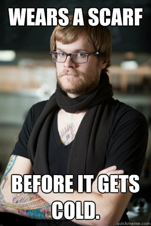 wears a scarf before it gets cold.  Hipster Barista