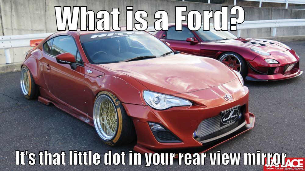 WHAT IS A FORD? IT'S THAT LITTLE DOT IN YOUR REAR VIEW MIRROR Misc