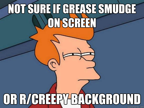 not sure if grease smudge on screen or r/creepy background  Futurama Fry