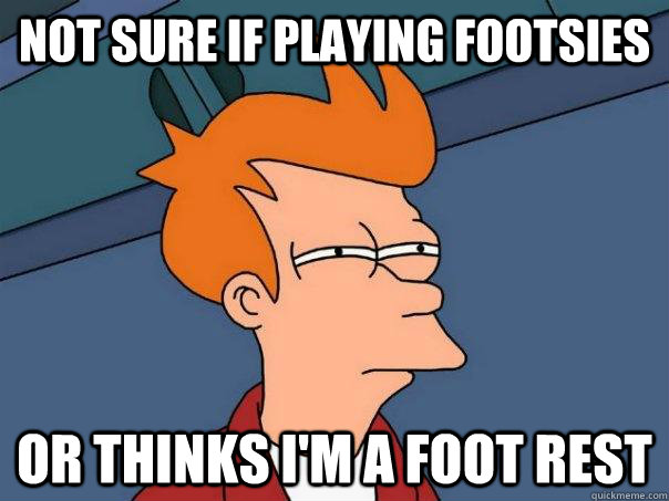 Not sure if playing footsies Or thinks i'm a foot rest  Futurama Fry