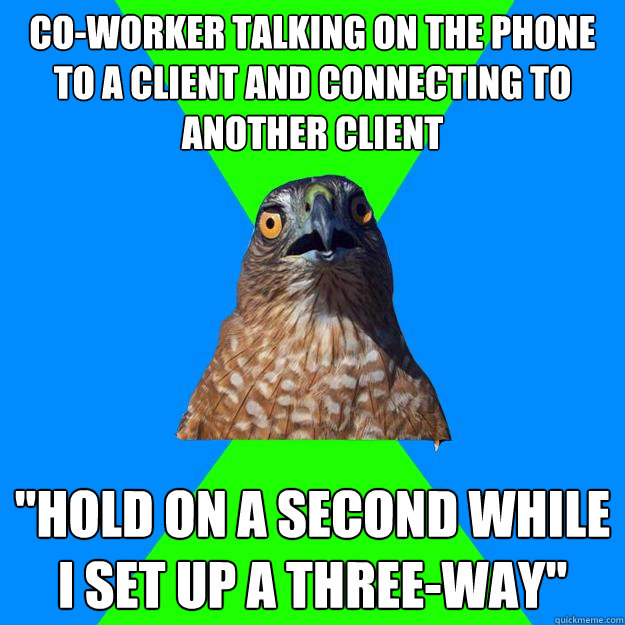 co-worker talking on the phone to a client and connecting to another client 