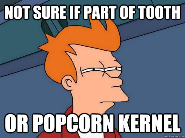 Not sure if part of tooth or popcorn kernel - Not sure if part of tooth or popcorn kernel  Futurama Fry