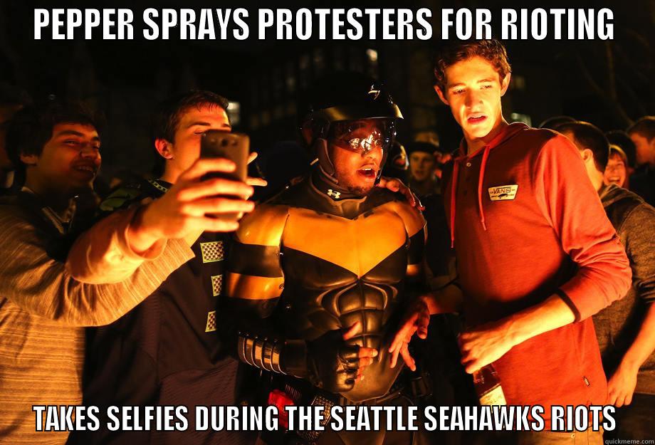 PEPPER SPRAYS PROTESTERS FOR RIOTING TAKES SELFIES DURING THE SEATTLE SEAHAWKS RIOTS Misc