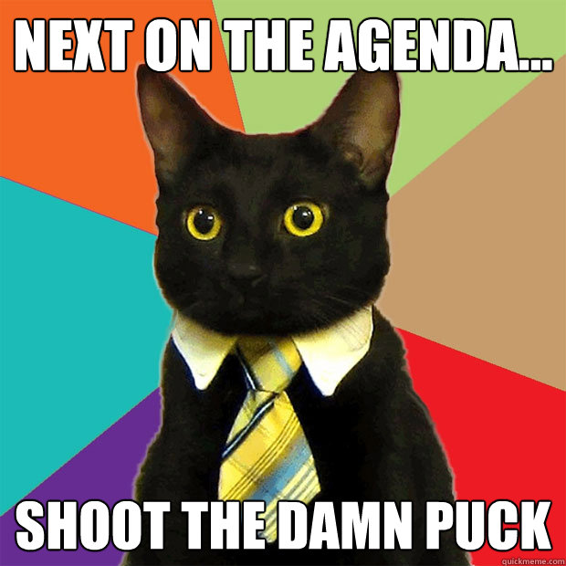 Next on the Agenda... SHOOT the DAMN PUCK  Business Cat