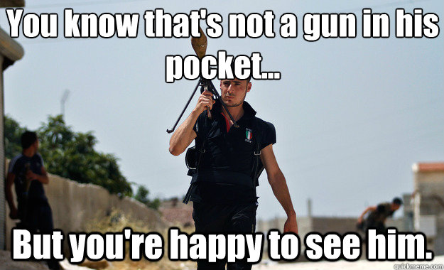 You know that's not a gun in his pocket... But you're happy to see him.   Ridiculously Photogenic Syrian Soldier