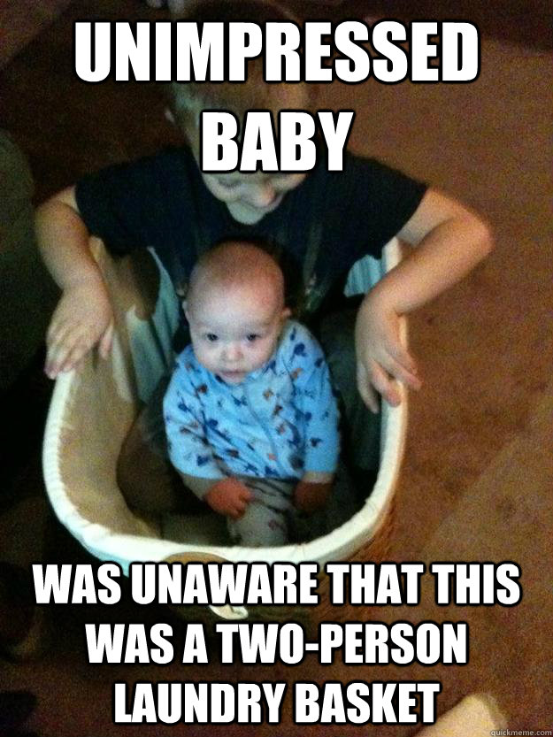 Unimpressed Baby Was unaware that this was a two-person laundry basket  