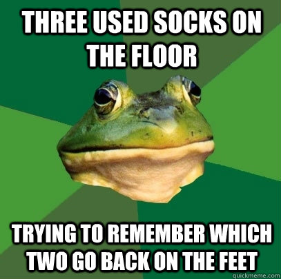 three used socks on the floor trying to remember which two go back on the feet - three used socks on the floor trying to remember which two go back on the feet  Foul Bachelor Frog