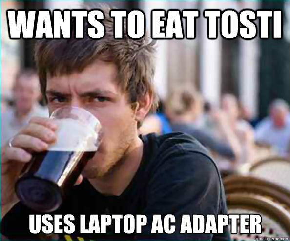 Wants to eat tosti uses laptop AC adapter  Lazy College Senior