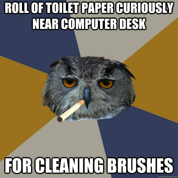 Roll of toilet paper curiously near computer desk for cleaning brushes - Roll of toilet paper curiously near computer desk for cleaning brushes  Art Student Owl