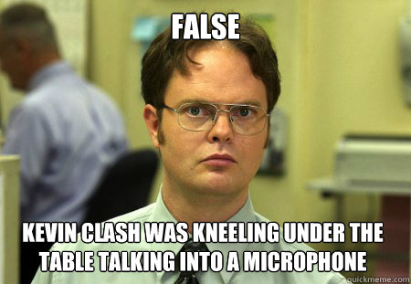 False Kevin Clash was kneeling under the table talking into a microphone  Dwight