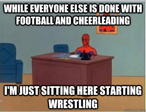 While everyone else is done with football and cheerleading I'm just sitting here starting wrestling  Spiderman Desk