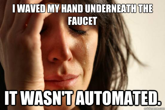 I waved my hand underneath the faucet it wasn't automated.  First World Problems