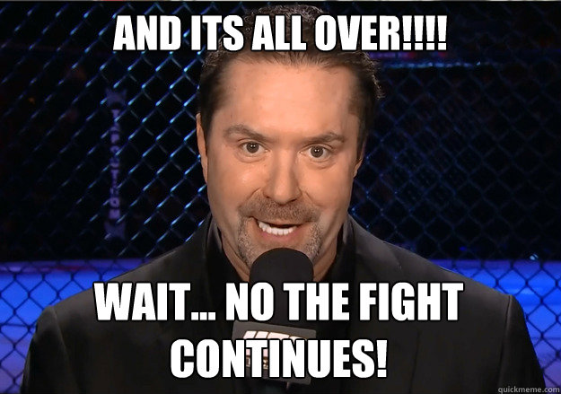 AND ITS ALL OVER!!!! WAIT... NO THE FIGHT CONTINUES!  Mike Goldberg