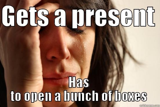 GETS A PRESENT  HAS TO OPEN A BUNCH OF BOXES First World Problems