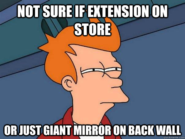 Not Sure if extension on store Or just giant mirror on back wall  Futurama Fry