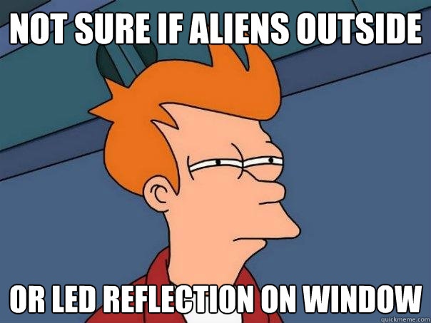 not sure if aliens outside or led reflection on window - not sure if aliens outside or led reflection on window  Futurama Fry