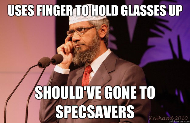 uses finger to hold glasses up should've gone to specsavers Caption 3 goes here  