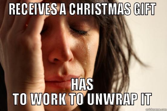 RECEIVES A CHRISTMAS GIFT HAS TO WORK TO UNWRAP IT First World Problems