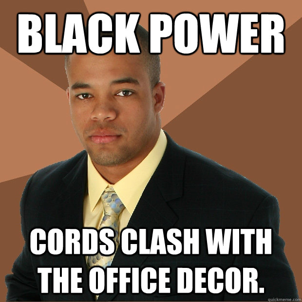 BLACK POWER cords clash with the office decor.  Successful Black Man