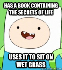 has a book containing the secrets of life uses it to sit on wet grass  