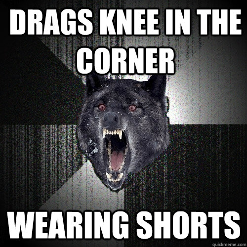 Drags knee in the corner wearing shorts  Insanity Wolf