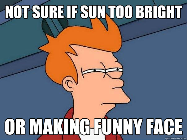 Not sure if sun too bright  or making funny face  Futurama Fry