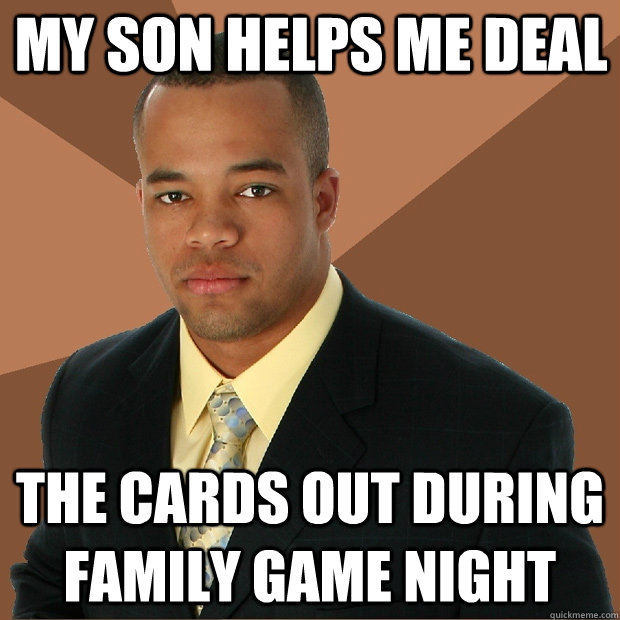 My son helps me deal the cards out during family game night  Successful Black Man