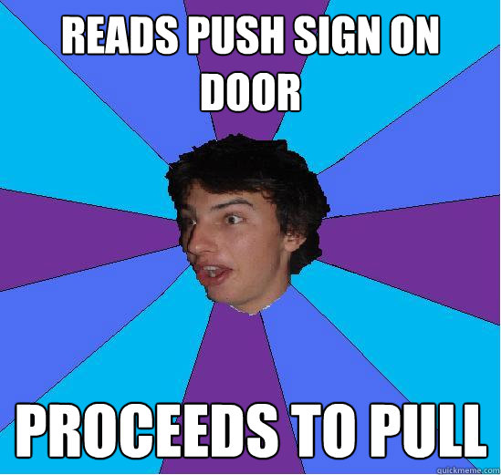 Reads push sign on door proceeds to pull  