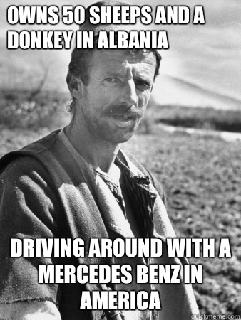 Owns 50 sheeps and a donkey in Albania  Driving around with a Mercedes benz in America - Owns 50 sheeps and a donkey in Albania  Driving around with a Mercedes benz in America  Typical Albanian