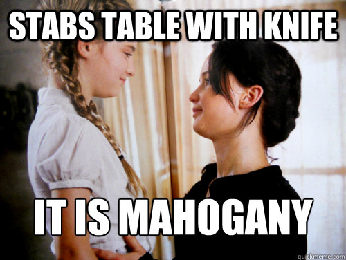 Stabs table with Knife It is Mahogany  Scumbag Katniss Everdeen