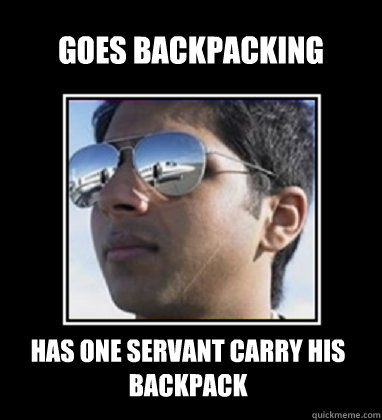 Goes backpacking has one servant carry his backpack  Rich Delhi Boy