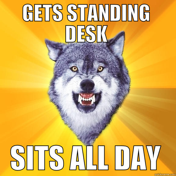 GETS STANDING DESK SITS ALL DAY Courage Wolf