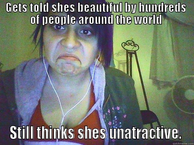 GETS TOLD SHES BEAUTIFUL BY HUNDREDS OF PEOPLE AROUND THE WORLD STILL THINKS SHES UNATTRACTIVE. Misc