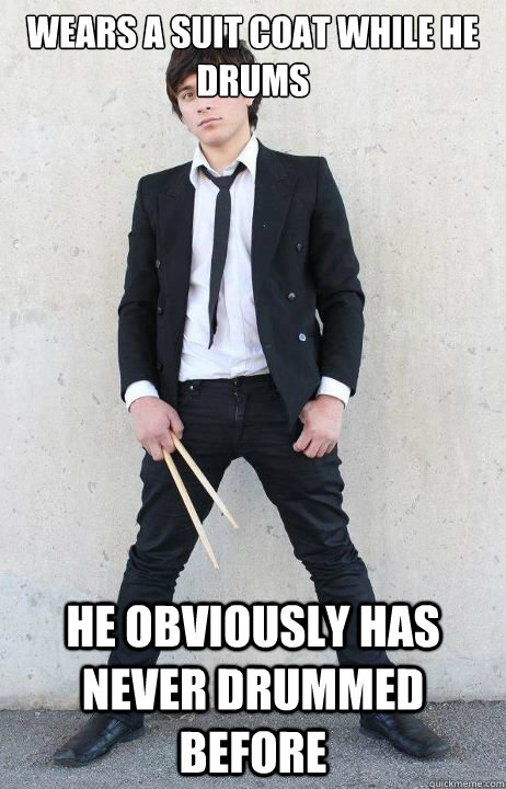 wears a suit coat while he drums He obviously has never drummed before  Hipster Alejandro