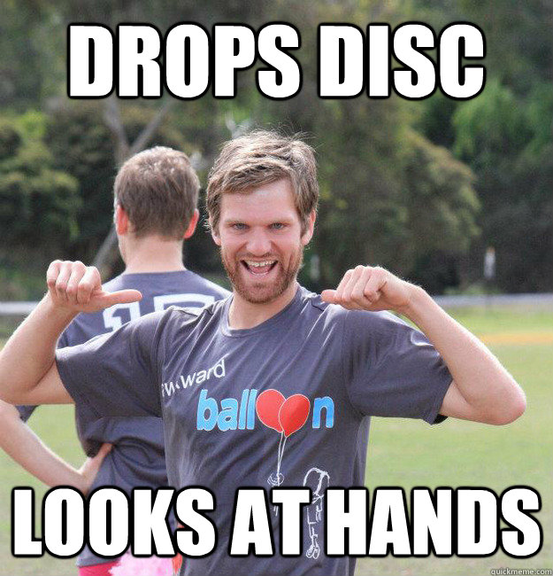 drops disc looks at hands  Intermediate Male Ultimate Player