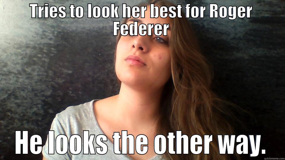 TRIES TO LOOK HER BEST FOR ROGER FEDERER HE LOOKS THE OTHER WAY. Misc