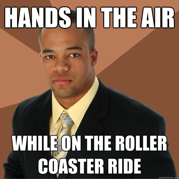 hands in the air while on the roller coaster ride  Successful Black Man