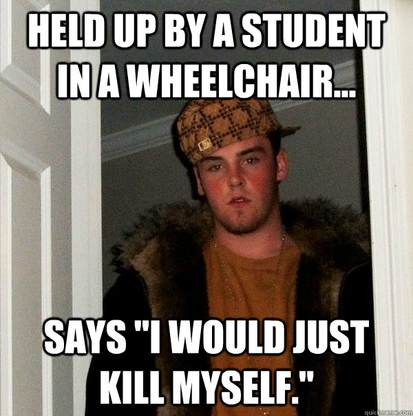 Held up by a student in a wheelchair... Says 