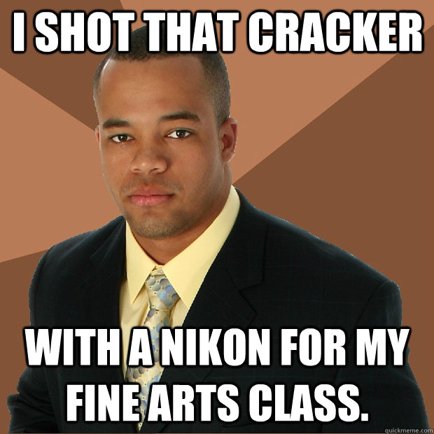 i shot that cracker with a Nikon for my fine arts class.  Successful Black Man